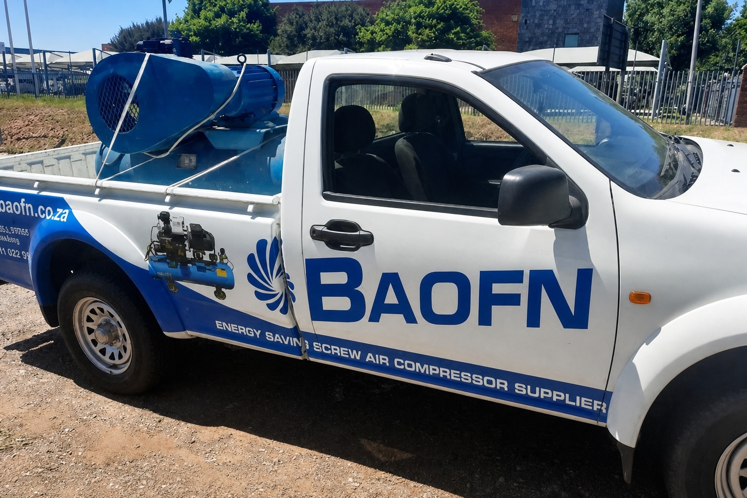 BAOFN bakkie with a hire compressor loaded for delivery to site