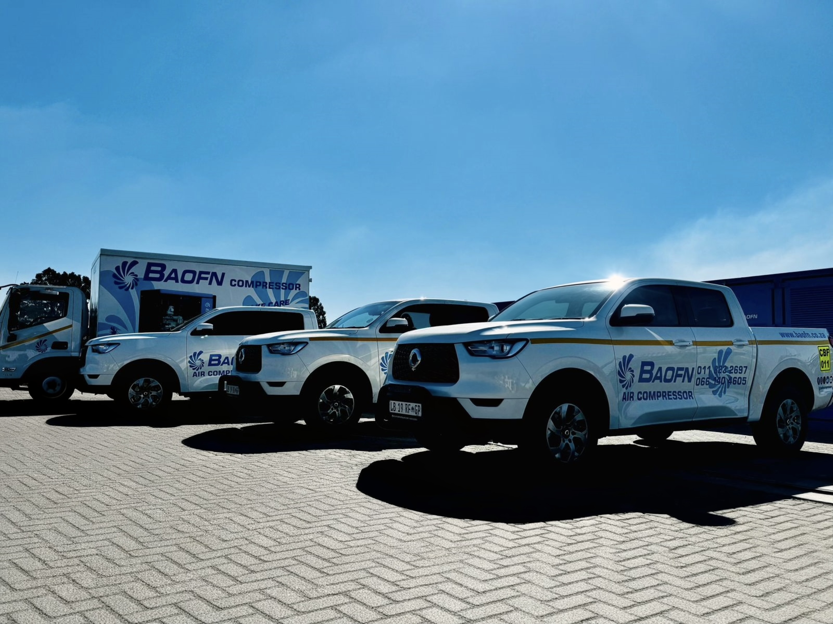 BAOFN service fleet and a compressor on a trailer at a customer site